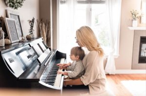 Mother and Son Playing the Piano
